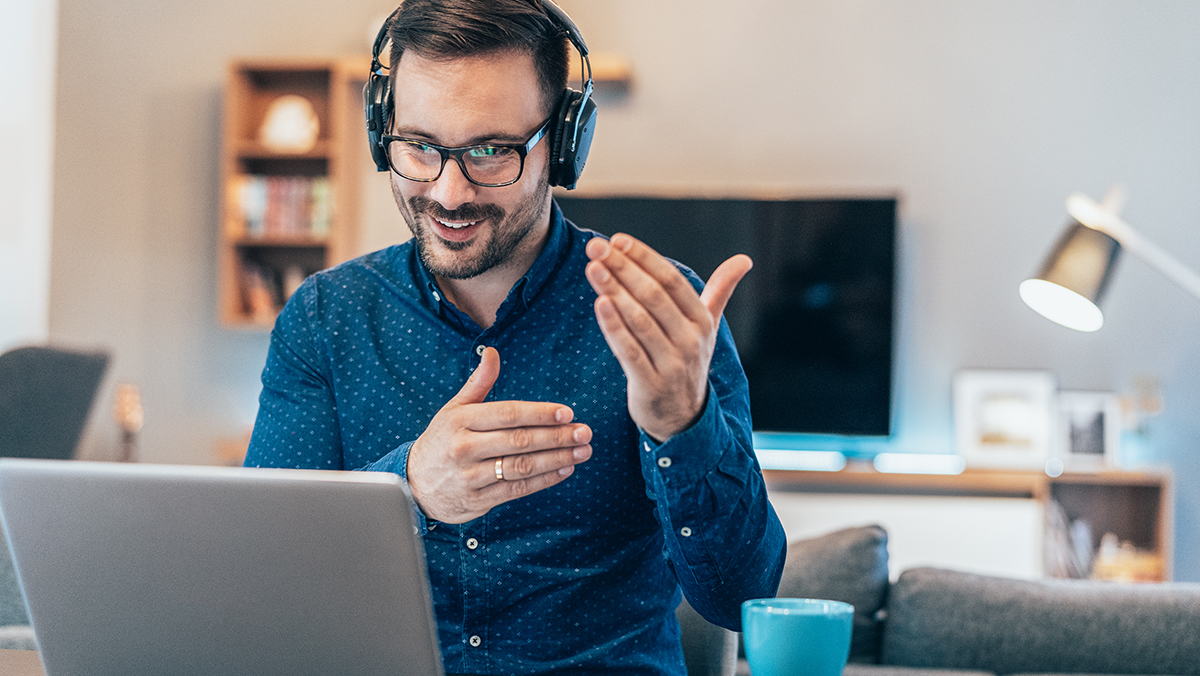 Man with headphones at pc